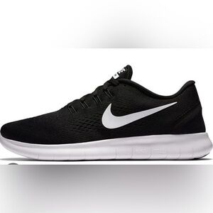 Nike Free Run sneakers size 6.5 in black and white